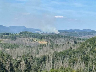 Výhled ze Šaunštejnu na začínající požár nad Hřenskem
